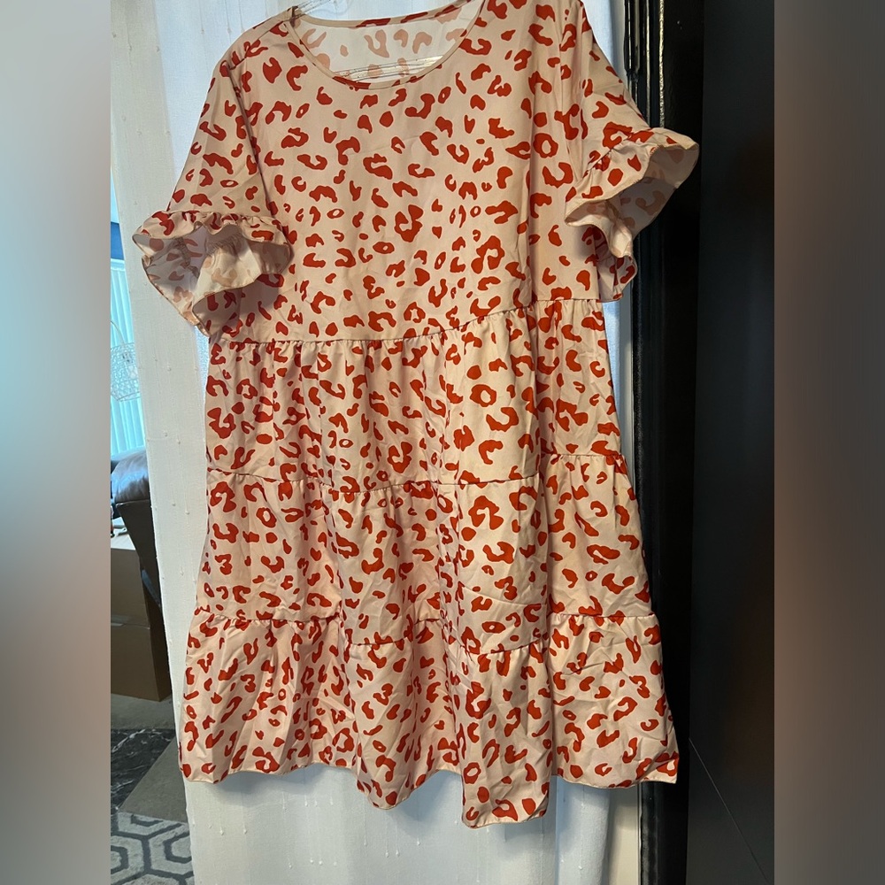 Cute leopard print dress with stacked detail.